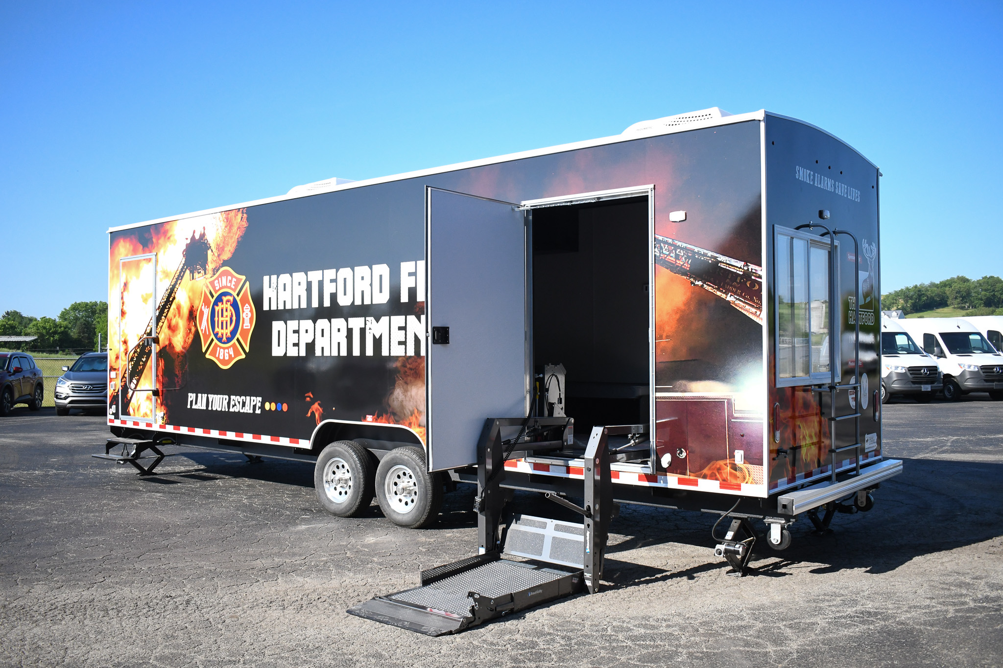 Exterior view displaying the wheelchair lift on the unit for Hartford, CT.