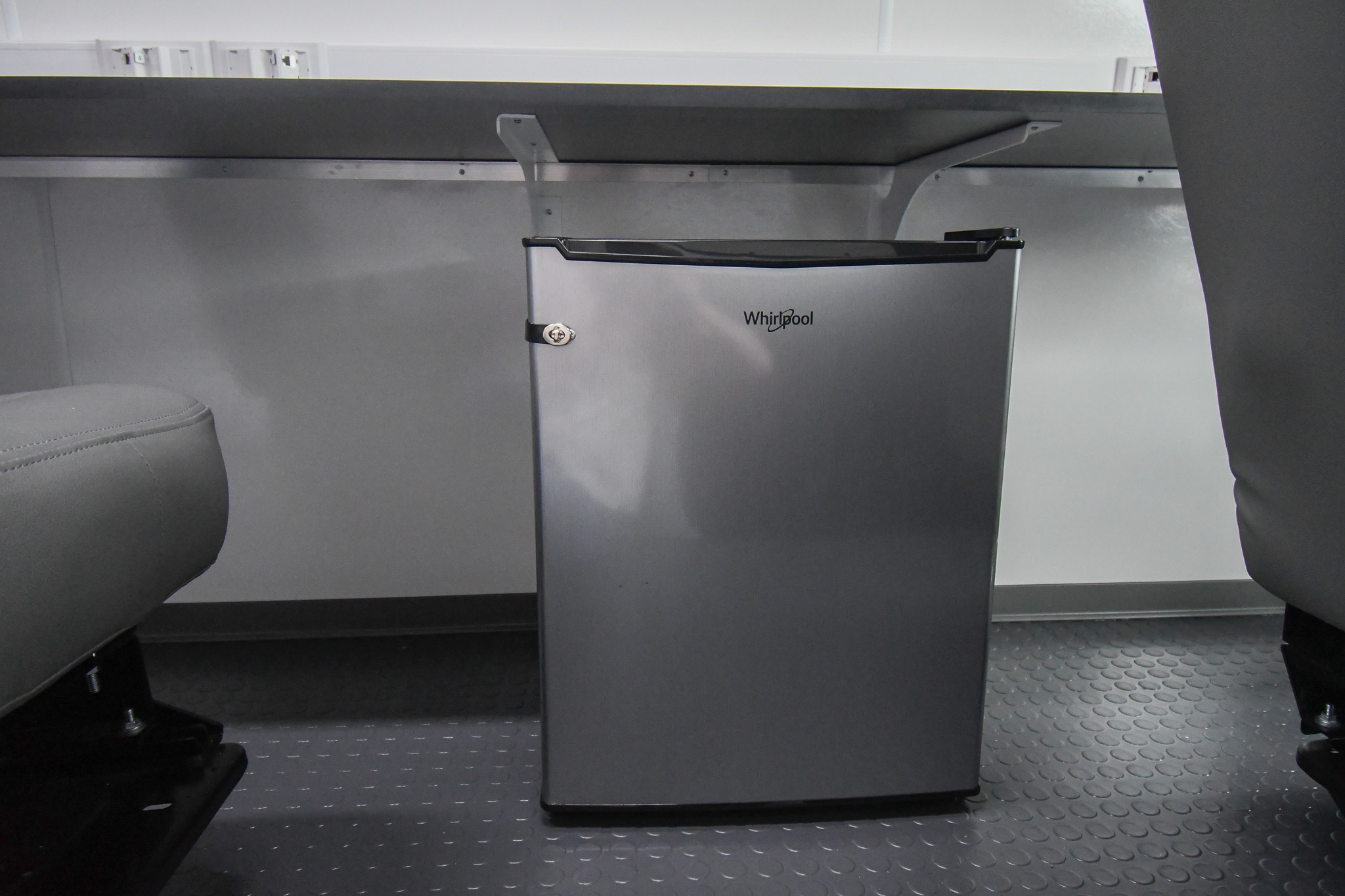 The refrigerator underneath the counter inside the unit for Patuxent River, MD.