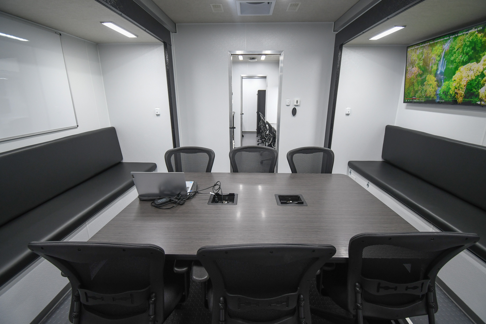 A front-to-back view of the conference room inside the unit for Bartlett, TN.