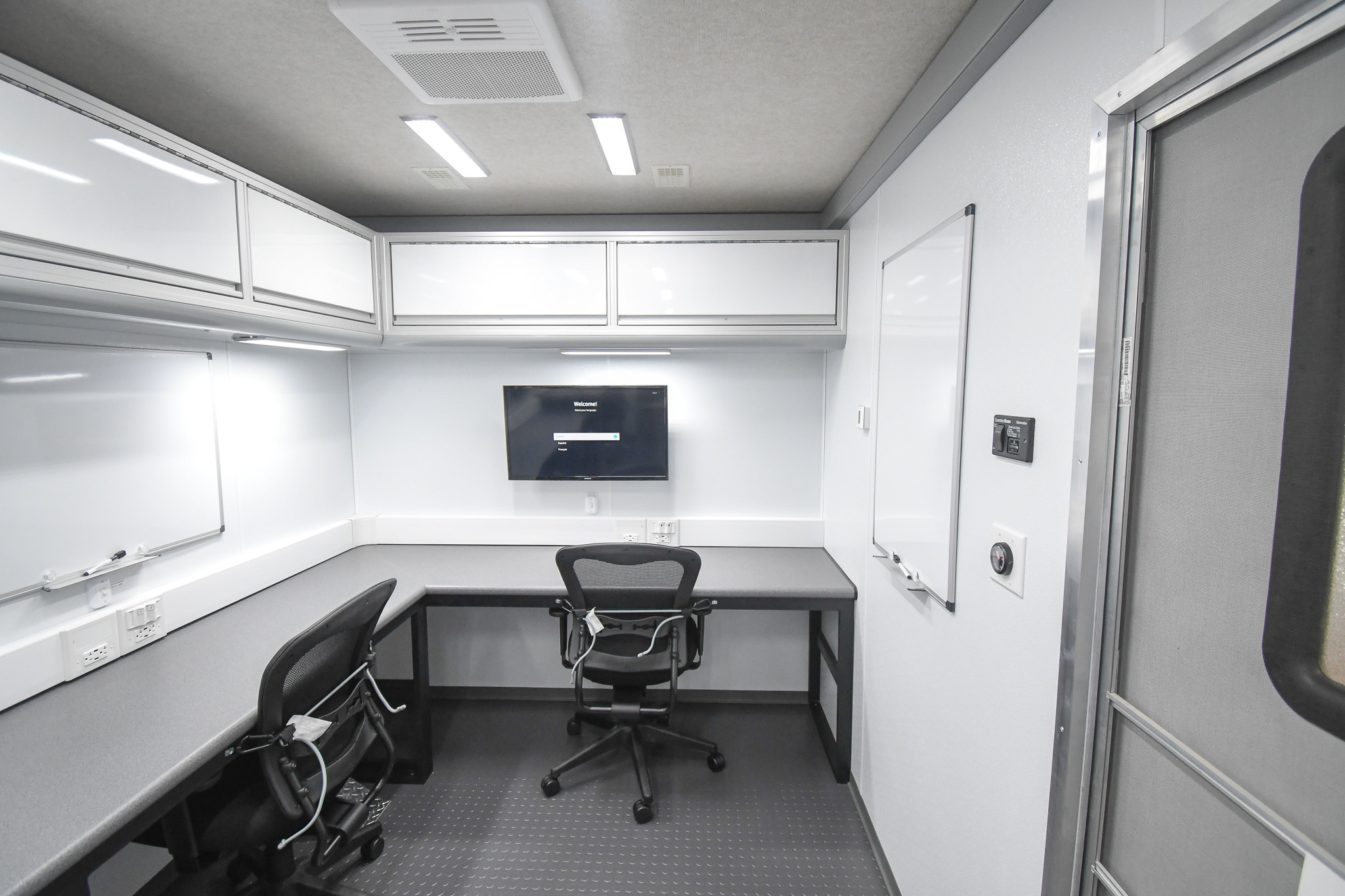 A view of two workstations out of four inside the unit for Kykostmovi, AZ.