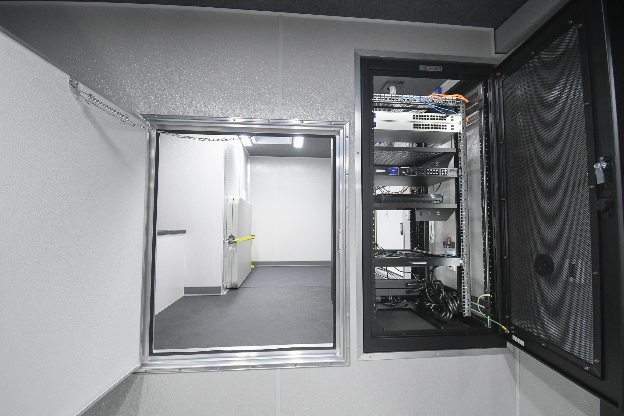 A view of the fifth wheel storage area and equipment rack inside the unit for Mechanicsburg, PA.