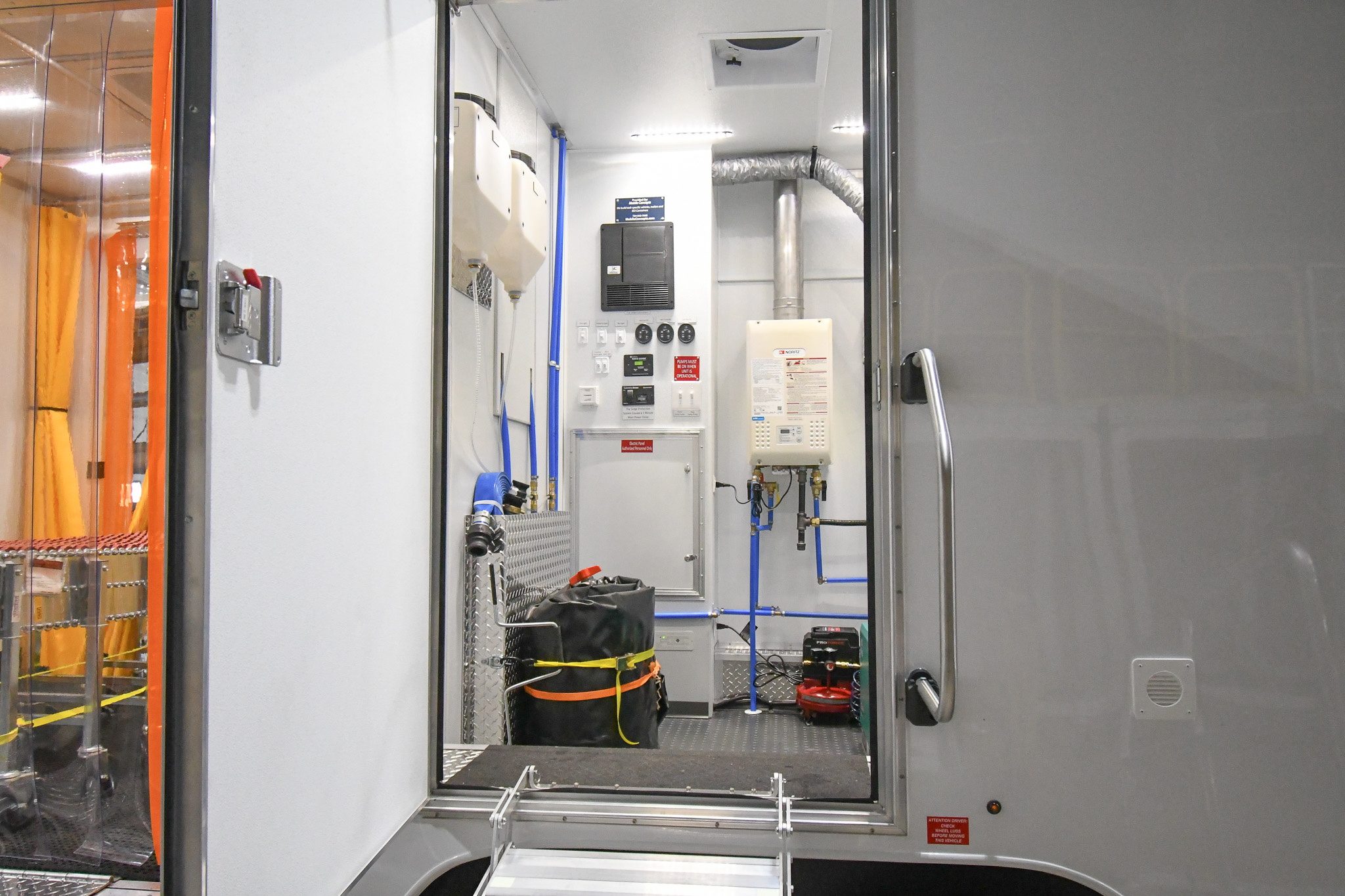 An exterior view of the maintenance room inside the unit for Fayetteville, AR.