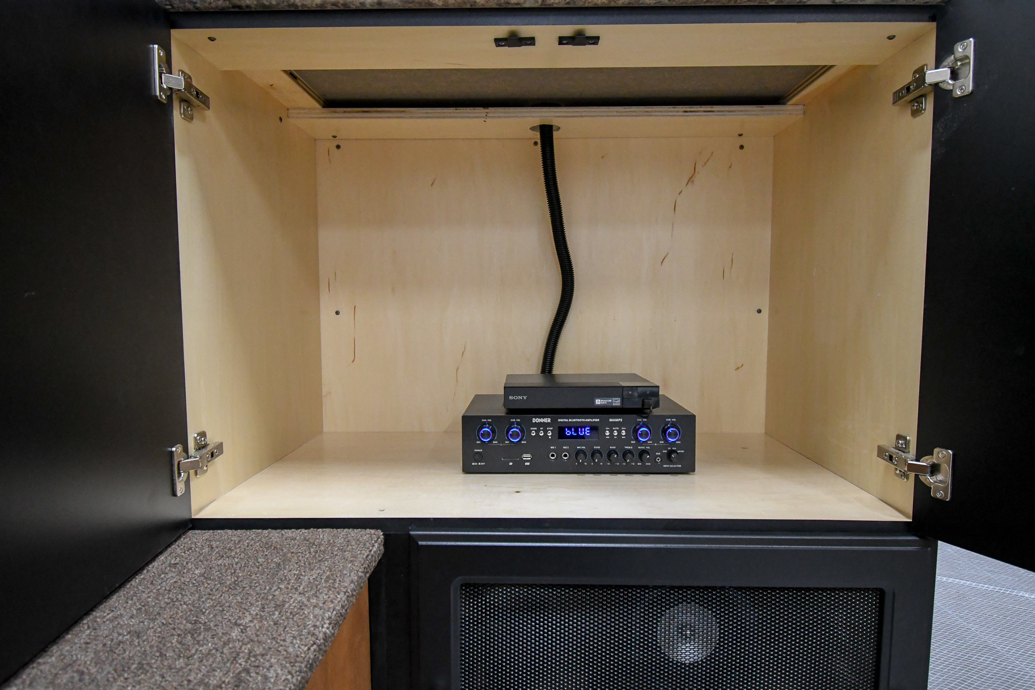 The media cabinet setup inside the unit for Modesto, CA.